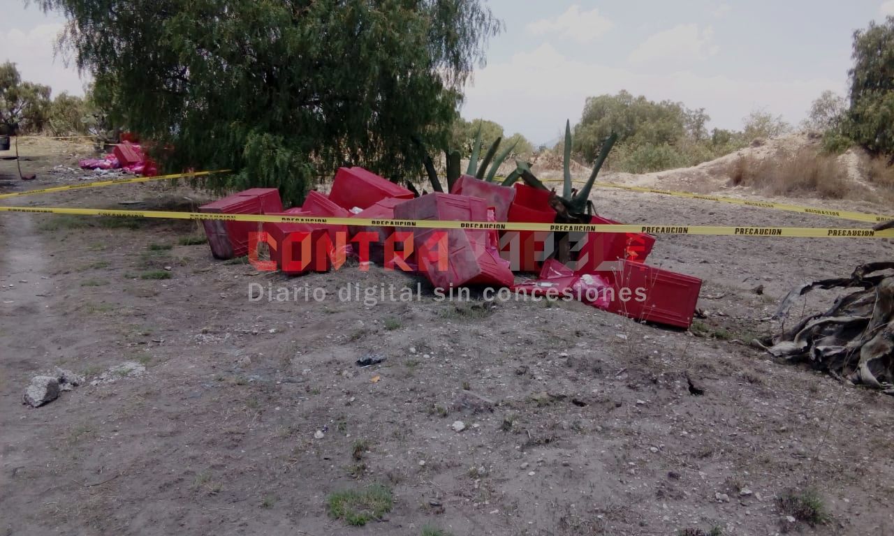 Abandonan cajas con desechos tóxicos hospitalarios en terreno de Teotihuacán 