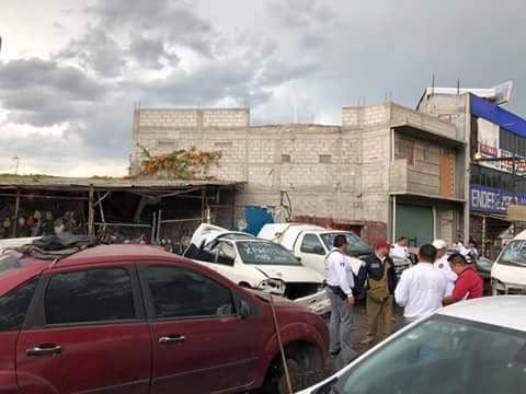 Aseguran tres inmuebles con vehículos y autopartes robadas en Atenco y Tezoyuca 