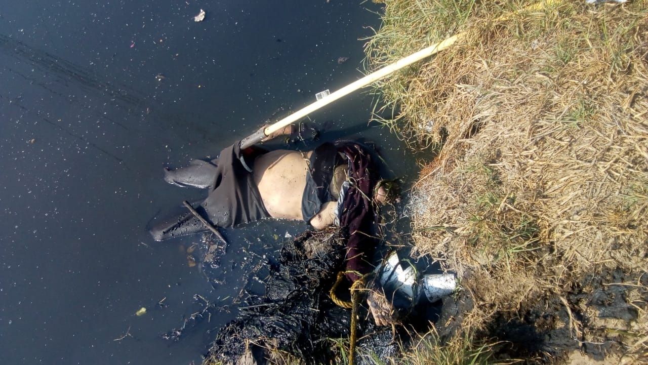 En Chimalhuacán rescatan el cadáver de una mujer en aguas negras en el Bordo de Xochiaca