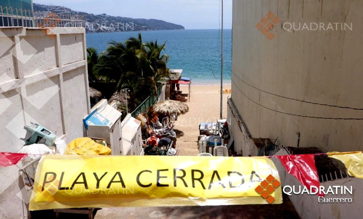 Cierre de playas en Acapulco ya es con cintas y letreros 