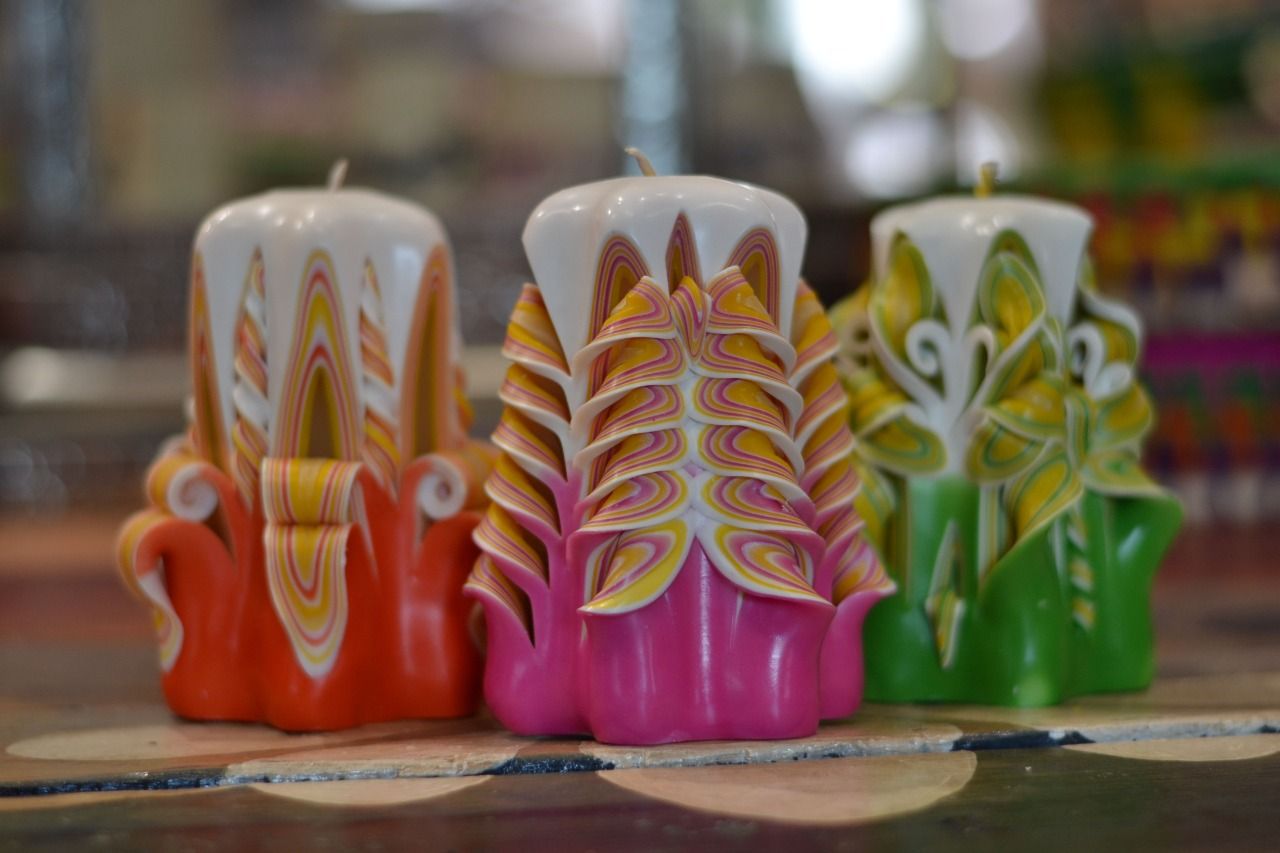 Plasman manos mexiquenses diseños en velas decorativas