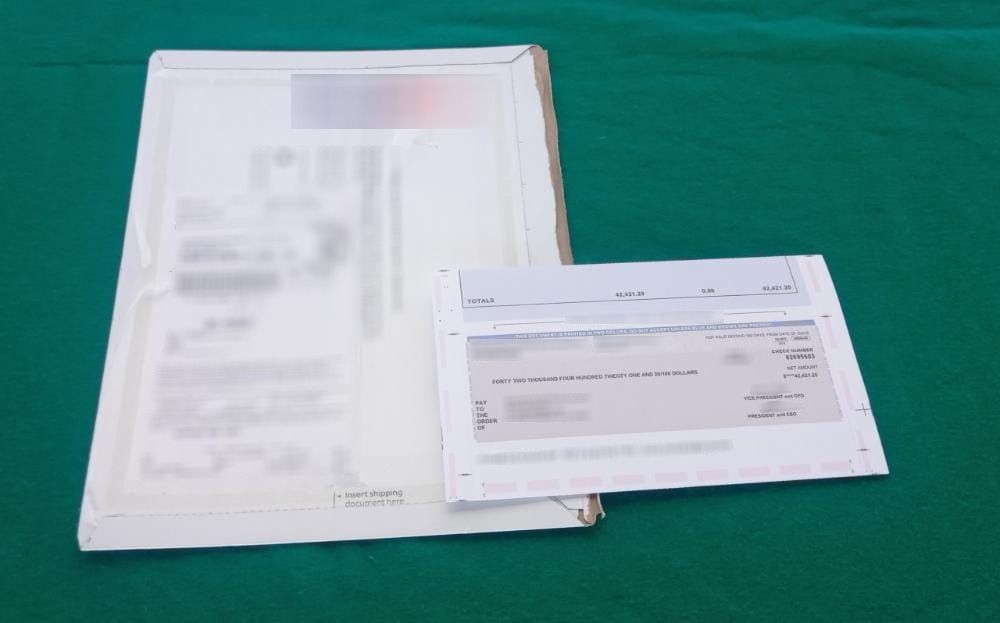 GN y Aduanas México interceptan cheque de más de 40 mil dólares 